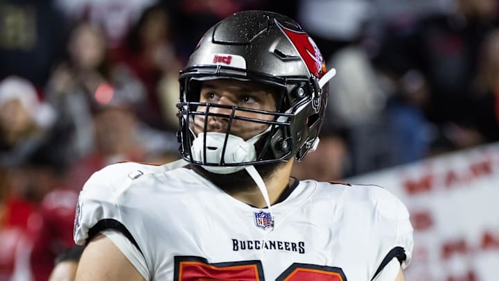 Dec 25, 2022; Glendale, Arizona, USA; Tampa Bay Buccaneers offensive tackle Robert Hainsey (70) against the Arizona Cardinals at State Farm Stadium. Mandatory Credit: Mark J. Rebilas-Imagn Images Dec 25, 2022; Glendale, Arizona, USA; Tampa Bay Buccaneers offensive tackle Robert Hainsey (70) against the Arizona Cardinals at State Farm Stadium. Mandatory Credit: Mark J. Rebilas-Imagn Images