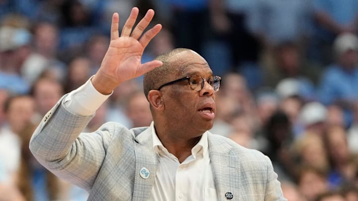 Mar 8, 2025; Chapel Hill, North Carolina, USA;  North Carolina Tar Heels head coach Hubert Davis reacts in the second half at Dean E. Smith Center. Mandatory Credit: Bob Donnan-Imagn Images