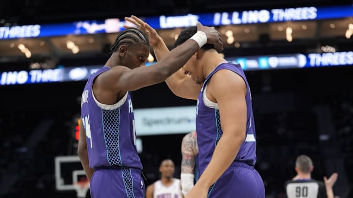 Charlotte Hornets forward Moussa DiabatÈ (14) and forward Grant Williams (2) celebrate a play during the second half Charlotte Hornets forward Moussa DiabatÈ (14) and forward Grant Williams (2) celebrate a play during the second half