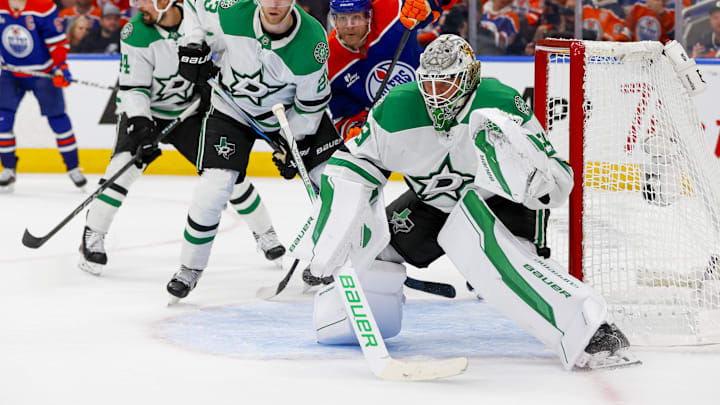 May 27, 2025; Edmonton, Alberta, CAN; Edmonton Oilers right wing Corey Perry (90) skates between Dallas Stars defenseman Esa Lindell (23) and goaltender Jake Oettinger (29) during the third period in game four of the Western Conference Final of the 2025 Stanley Cup Playoffs at Rogers Place. Mandatory Credit: Perry Nelson-Imagn Images