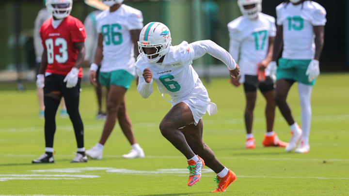 Miami Dolphins wide receiver Malik Washington (6) practices during mandatory minicamp at Hard Rock Stadium. Miami Dolphins wide receiver Malik Washington (6) practices during mandatory minicamp at Hard Rock Stadium.