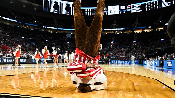 Mar 19, 2026; Portland, OR, USA; The Wisconsin Badgers mascot performs during a time out during the second half of a first round game of the men's 2026 NCAA Tournament against the High Point Panthers at Moda Center. Mandatory Credit: Craig Strobeck-Imagn Images
