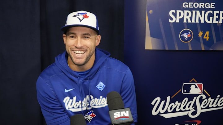 Oct 23, 2025; Toronto, ON, Canada; Toronto Blue Jays designated hitter George Springer (4) smiles after a question at the World Series media day interviews at Rogers Centre. 