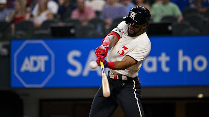 Jul 14, 2023; Arlington, Texas, USA; Texas Rangers center fielder Leody Taveras (3) hits a double