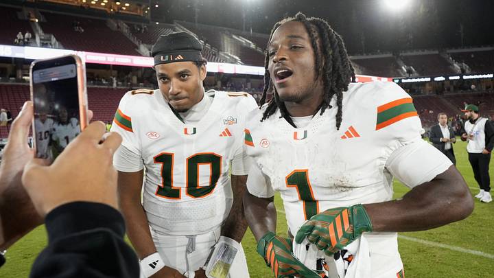Sep 4, 2026; Stanford, California, USA; Miami Hurricanes quarterback Darian Mensah (10) and wide receiver Malachi Toney (1) on the field after defeating the Stanford Cardinal at Stanford Stadium. Mandatory Credit: Stan Szeto-Imagn Images Sep 4, 2026; Stanford, California, USA; Miami Hurricanes quarterback Darian Mensah (10) and wide receiver Malachi Toney (1) on the field after defeating the Stanford Cardinal at Stanford Stadium. Mandatory Credit: Stan Szeto-Imagn Images