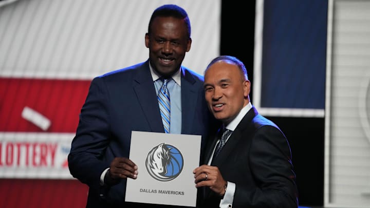 May 12, 2025; Chicago, Illinois, US; Rolando Blackman of the Dallas Mavericks poses with Mark Tatum NBA Deputy Commissioner after winning the the first pick during the 2025 NBA Draft Lottery at McCormick Place. Mandatory Credit: David Banks-Imagn Images