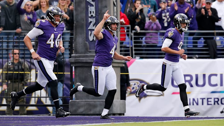 Baltimore Ravens long snapper Morgan Cox (46), punter Sam Koch (4) and kicker Justin Tucker (9) take the field before the first quarter of the NFL Week 6 game between the Baltimore Ravens and the Cincinnati Bengals at M&T Bank Stadium in Baltimore on Sunday, Oct. 13, 2019.Cincinnati Bengals At Baltimore Ravens