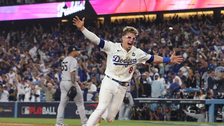Oct 25, 2024; Los Angeles, California, USA; Los Angeles Dodgers third baseman Enrique Hernandez (8) celebrates defeating the New York Yankees during game one of the 2024 MLB World Series at Dodger Stadium. Mandatory Credit:  Jason Parkhurst-Imagn Images