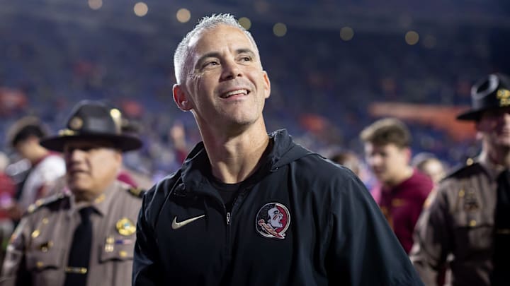 Florida State Seminoles head coach Mike Norvell smiles to the crowd after the game against the Florida Gators at Steve Spurrier Field at Ben Hill Griffin Stadium in Gainesville, FL on Saturday, November 25, 2023. [Matt Pendleton/Gainesville Sun]