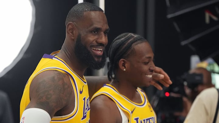 Sep 30, 2024; El Segundo, CA, USA; Los Angeles Lakers foward LeBron James (23) with guard Quincy Olivari (41) during media day at the UCLA Health Training Center. Mandatory Credit: Kirby Lee-Imagn Images