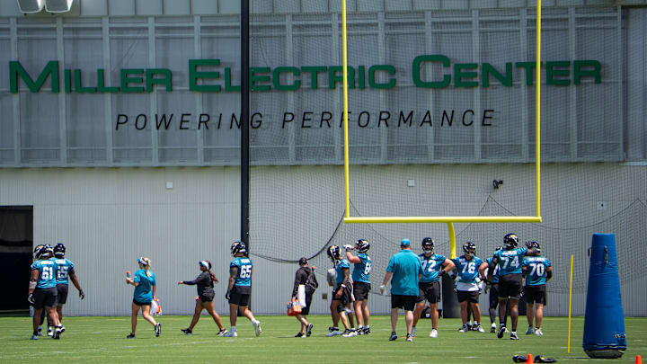 Jacksonville Jaguars offensive players walk to their next station during the fourth organized team activity at the Miller Electric Center in Jacksonville, Fla. Tuesday, May 27, 2025. [Doug Engle/Florida Times-Union]