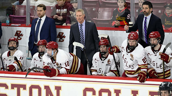 Feb 28, 2025; Chestnut Hill, MA, USA; Boston College Eagles head coach Greg Brown (center) looks on during the third period against the University of New Hampshire Wildcats at Conte Forum. Mandatory Credit: Eric Canha-Imagn Images