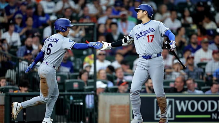May 6, 2026; Houston, Texas, USA; Los Angeles Dodgers shortstop Hyeseong Kim (6) is congratulated by designated hitter Shohei Ohtani (17) after scoring a run against the Houston Astros during the seventh inning at Daikin Park. Mandatory Credit: Erik Williams-Imagn Images
May 6, 2026; Houston, Texas, USA; Los Angeles Dodgers shortstop Hyeseong Kim (6) is congratulated by designated hitter Shohei Ohtani (17) after scoring a run against the Houston Astros during the seventh inning at Daikin Park. Mandatory Credit: Erik Williams-Imagn Images