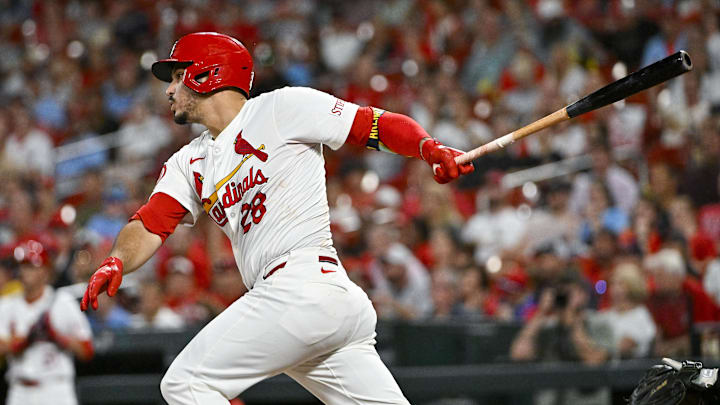 Sep 16, 2024; St. Louis, Missouri, USA;  St. Louis Cardinals third baseman Nolan Arenado (28) hits a one run single against the Pittsburgh Pirates during the fourth inning at Busch Stadium. Mandatory Credit: Jeff Curry-Imagn Images