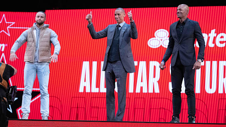 February 19, 2022; Cleveland, OH, USA; Golden State Warriors guard Stephen Curry (30, left) and NBA great Reggie Miller (center) and NBA great Ray Allen (right) during the 3-Point Contest during the 2022 NBA All-Star Saturday Night at Rocket Mortgage Field House. Mandatory Credit: Kyle Terada-Imagn Images