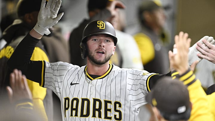 Apr 1, 2025; San Diego, California, USA; San Diego Padres center fielder Jackson Merrill (3) is congratulated after hitting a solo home run during the fourth inning against the Cleveland Guardians at Petco Park. Mandatory Credit: Denis Poroy-Imagn Images