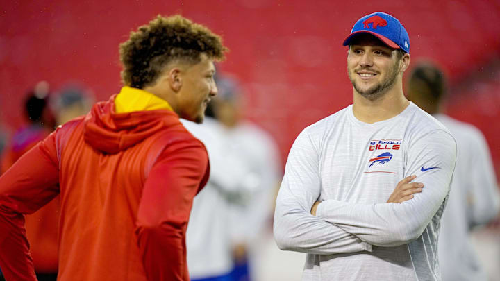 Buffalo Bills quarterback Josh Allen (17) talks with Patrick Mahomes.
