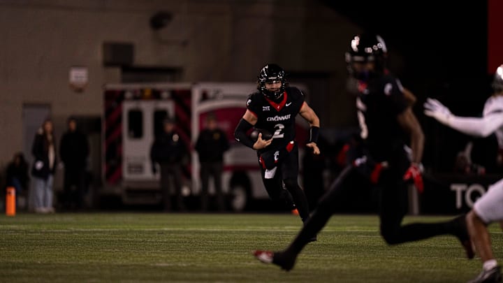 Cincinnati Bearcats quarterback Brendan Sorsby (2) runs downfield in the second quarter of the NCAA football game between Cincinnati Bearcats and TCU Horned Frogs at Nippert Stadium in Cincinnati on Saturday, Nov. 30, 2024.