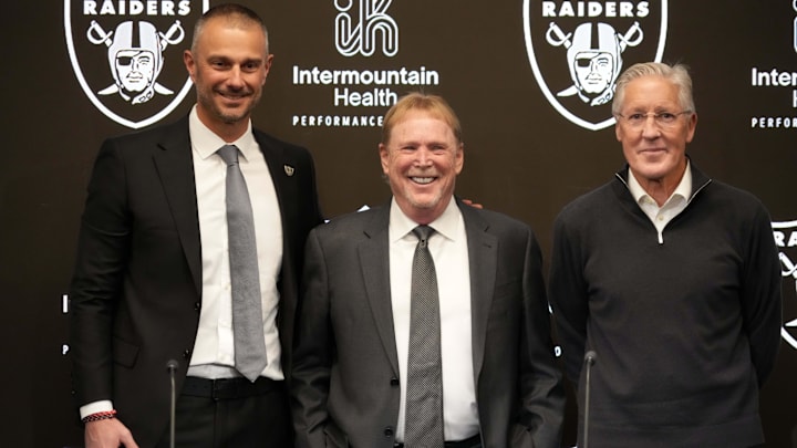 Jan 27, 2025; Las Vegas, NV, USA; Las Vegas Raiders general manager John Spytek (left), owner Mark Davis (center) and coach Pete Carroll pose at press conference at Intermountain Health Performance Center. Mandatory Credit: Kirby Lee-Imagn Images Jan 27, 2025; Las Vegas, NV, USA; Las Vegas Raiders general manager John Spytek (left), owner Mark Davis (center) and coach Pete Carroll pose at press conference at Intermountain Health Performance Center. Mandatory Credit: Kirby Lee-Imagn Images