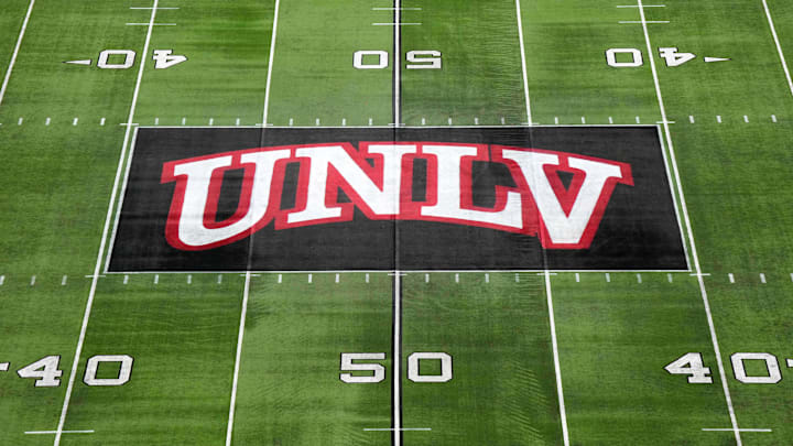 The UNLV Rebels logo at midfield during the Mountain West Championship at Allegiant Stadium. Mandatory Credit: Kirby Lee-Imagn Images