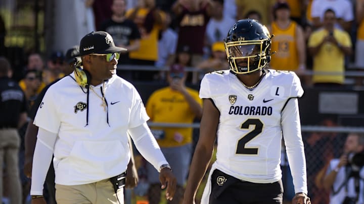 Oct 7, 2023; Tempe, Arizona, USA; Colorado Buffaloes head coach Deion Sanders with son and