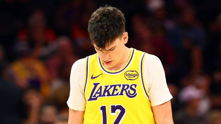 Oct 14, 2025; Phoenix, Arizona, USA; Los Angeles Lakers forward Jake LaRavia (12) reacts against the Phoenix Suns during an NBA preseason game at Mortgage Matchup Center. Mandatory Credit: Mark J. Rebilas-Imagn Images Oct 14, 2025; Phoenix, Arizona, USA; Los Angeles Lakers forward Jake LaRavia (12) reacts against the Phoenix Suns during an NBA preseason game at Mortgage Matchup Center. Mandatory Credit: Mark J. Rebilas-Imagn Images