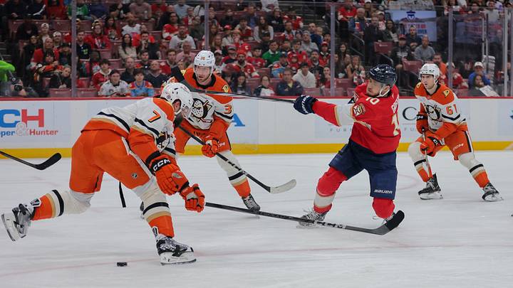 Jan 18, 2025; Sunrise, Florida, USA; Florida Panthers left wing A.J. Greer (10) shoots the puck against the Anaheim Ducks during the first period at Amerant Bank Arena. Mandatory Credit: Sam Navarro-Imagn Images