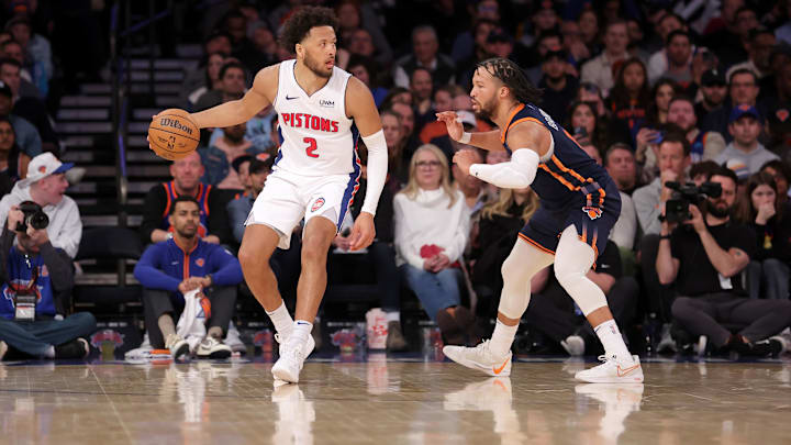 Feb 26, 2024; New York, New York, USA; Detroit Pistons guard Cade Cunningham (2) controls the ball against New York Knicks guard Jalen Brunson (11) during the fourth quarter at Madison Square Garden. Mandatory Credit: Brad Penner-Imagn Images