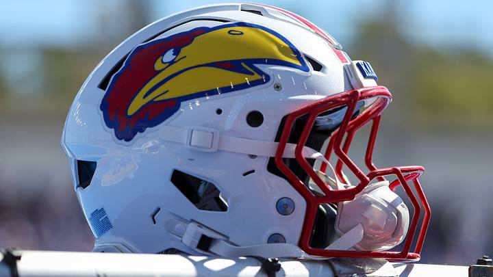 Oct 3, 2026; Lawrence, Kansas, USA; A Kansas Jayhawks helmet sits on top of a cooling tent during a game against the Middle Tennessee Blue Raiders at David Booth Kansas Memorial Stadium. Mandatory Credit: Scott Sewell-Imagn Images Oct 3, 2026; Lawrence, Kansas, USA; A Kansas Jayhawks helmet sits on top of a cooling tent during a game against the Middle Tennessee Blue Raiders at David Booth Kansas Memorial Stadium. Mandatory Credit: Scott Sewell-Imagn Images