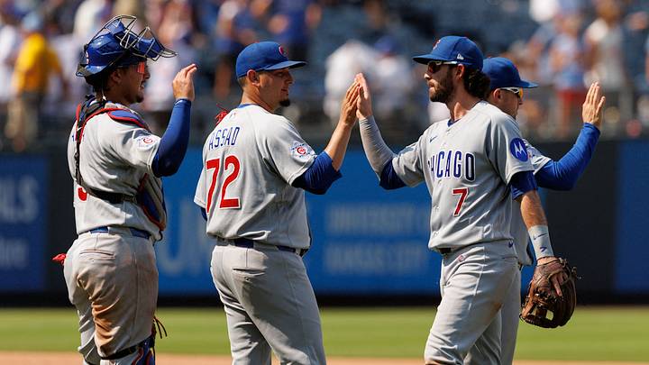 Aug 9, 2026; Kansas City, Missouri, USA; Chicago Cubs shortstop Dansby Swanson (7) slaps hands with Chicago Cubs pitcher Javier Assad (72) after the game against the Kansas City Royals at Kauffman Stadium. Mandatory Credit: William Purnell-Imagn Images Aug 9, 2026; Kansas City, Missouri, USA; Chicago Cubs shortstop Dansby Swanson (7) slaps hands with Chicago Cubs pitcher Javier Assad (72) after the game against the Kansas City Royals at Kauffman Stadium. Mandatory Credit: William Purnell-Imagn Images