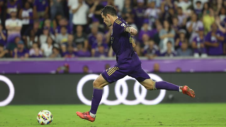 Nov 9, 2024; Orlando, Florida, USA; Orlando City defender Kyle Smith (24) takes a penalty kick in a round of penalty kicks against the Charlotte FC in a 2024 MLS Cup Playoffs Round One match at Inter&Co Stadium. Mandatory Credit: Kim Klement Neitzel-Imagn Images