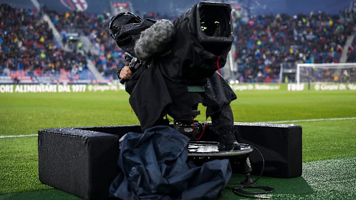 A cameraman works with a TV camera prior to the Serie A