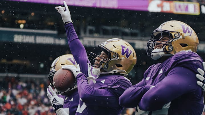 Thaddeus Dixon celebrates an Apple Cup interception. Thaddeus Dixon celebrates an Apple Cup interception.