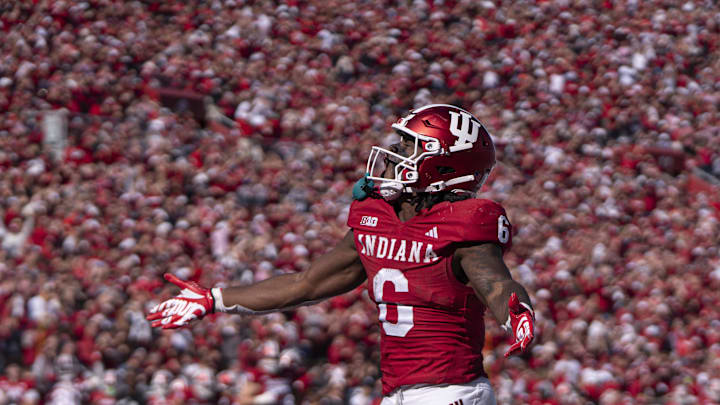 Indiana Hoosiers running back Justice Ellison (6) celebrates scoring a touchdown during the third quarter against the Washington Huskies at Memorial Stadium.