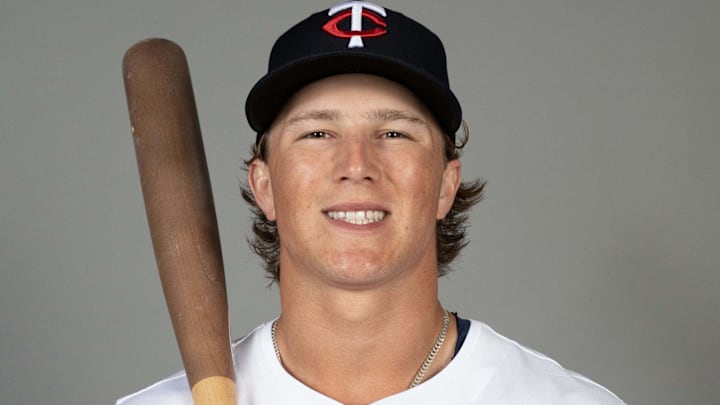 Feb 21, 2025; Fort Myers, FL, USA;  Minnesota Twins first infielder Luke Keaschall (74) takes photos during media day.  Mandatory Credit: Chris Tilley-Imagn Images