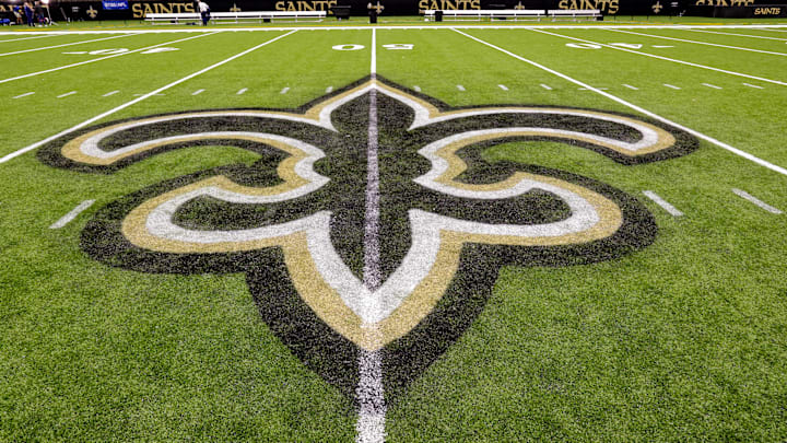 Oct 30, 2022; New Orleans, Louisiana, USA;  General view of the New Orleans Saints logo as the midfield logo fleur-de-lis after the game between the New Orleans Saints and the Las Vegas Raiders at Caesars Superdome. Mandatory Credit: Stephen Lew-Imagn Images