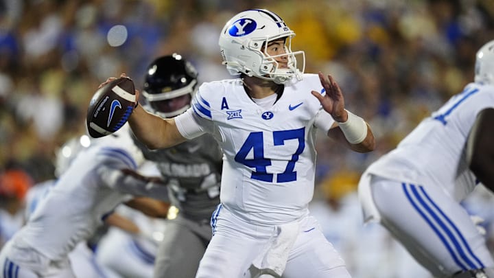 Sep 27, 2025; Boulder, Colorado, USA; Brigham Young Cougars quarterback Bear Bachmeier (47) prepares to pass in the second quarter against the Colorado Buffaloes at Folsom Field. Mandatory Credit: Ron Chenoy-Imagn Images