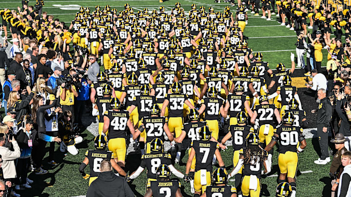 Oct 26, 2024; Iowa City, Iowa, USA; The Iowa Hawkeyes Swarm enters Kinnick Stadium before a game against the Northwestern Wildcats. Mandatory Credit: Jeffrey Becker-Imagn Images