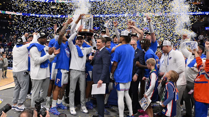 The Florida Gators celebrate after defeating the Tennessee Volunteers in the 2025 SEC Championship Game at Bridgestone Arena.