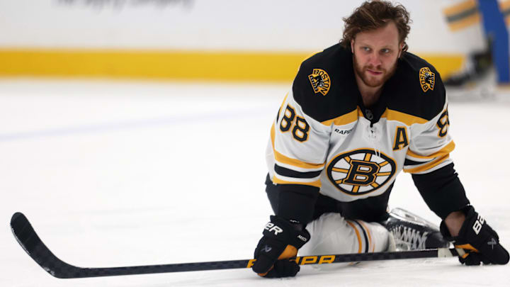 Apr 13, 2025; Pittsburgh, Pennsylvania, USA;  Boston Bruins right wing David Pastrnak (88) warms up before the game against the Pittsburgh Penguins at PPG Paints Arena. Mandatory Credit: Charles LeClaire-Imagn Images