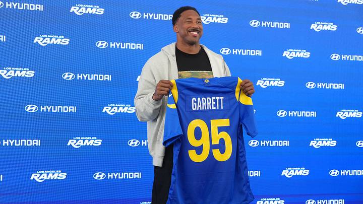 Jun 2, 2026; Woodland Hills, CA, USA; Los Angeles Rams defensive end Myles Garrett (95) poses with jersey at press conference at Rams Practice Facility. Mandatory Credit: Kirby Lee-Imagn Images Jun 2, 2026; Woodland Hills, CA, USA; Los Angeles Rams defensive end Myles Garrett (95) poses with jersey at press conference at Rams Practice Facility. Mandatory Credit: Kirby Lee-Imagn Images