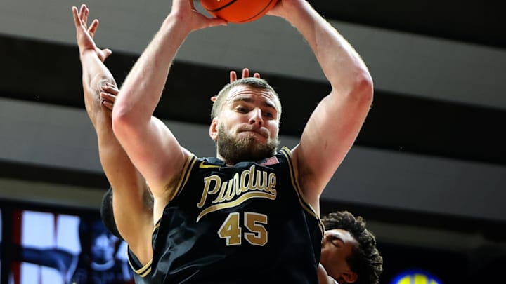 Purdue Boilermakers center Oscar Cluff (45) grabs a rebound 