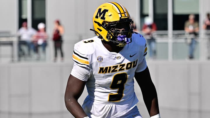 Oct 12, 2024; Amherst, Massachusetts, USA; Missouri Tigers defensive end Zion Young (9) lines up against the Massachusetts Minutemen during the second half at Warren McGuirk Alumni Stadium. Mandatory Credit: Eric Canha-Imagn Images Oct 12, 2024; Amherst, Massachusetts, USA; Missouri Tigers defensive end Zion Young (9) lines up against the Massachusetts Minutemen during the second half at Warren McGuirk Alumni Stadium. Mandatory Credit: Eric Canha-Imagn Images