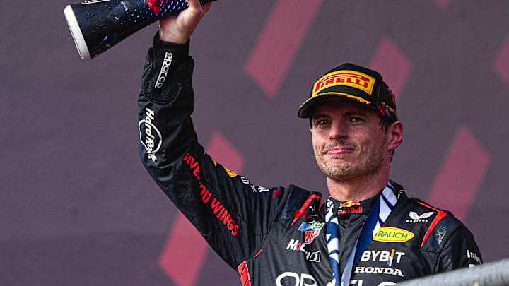 Oracle Red Bull Racing driver Max Verstappen hoists the trophy after winning the Formula 1 Lenovo