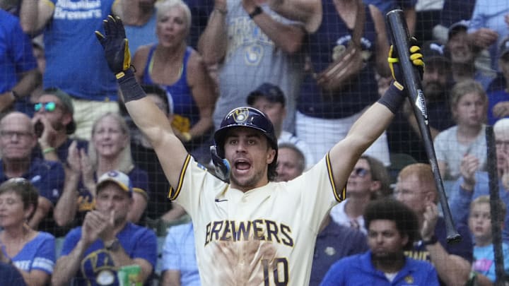 Aug 13, 2025; Milwaukee, Wisconsin, USA; Milwaukee Brewers outfielder Sal Frelick (10) celebrates as Milwaukee Brewers outfielder Blake Perkins (16) prepares to cross home plate against the Pittsburgh Pirates in the fourtfh inning at American Family Field. Mandatory Credit: Michael McLoone-Imagn Images