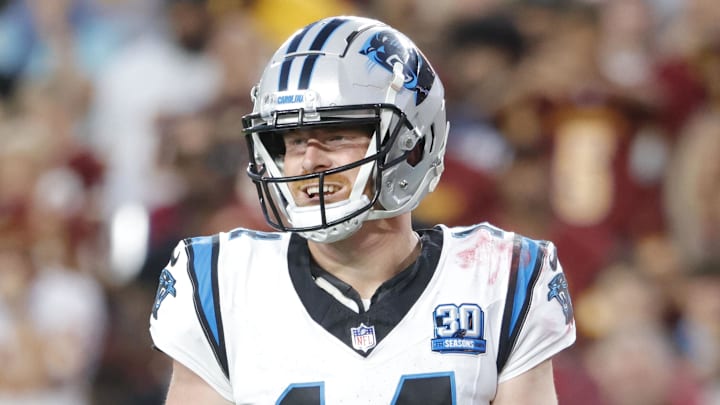 Carolina Panthers quarterback Andy Dalton (14) looks on from the field during the second half against the Washington Commanders at Northwest Stadium.