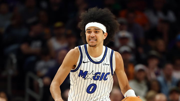 Feb 21, 2026; Phoenix, Arizona, USA; Orlando Magic guard Anthony Black (0) against the Phoenix Suns at Mortgage Matchup Center. Mandatory Credit: Mark J. Rebilas-Imagn Images