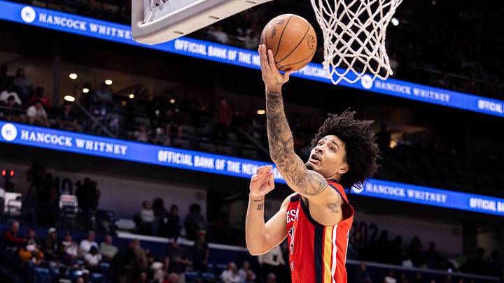 Apr 7, 2026; New Orleans, Louisiana, USA; New Orleans Pelicans guard/forward Micah Peavy (14) shoots the ball against the Utah Jazz during the first half at Smoothie King Center. Apr 7, 2026; New Orleans, Louisiana, USA; New Orleans Pelicans guard/forward Micah Peavy (14) shoots the ball against the Utah Jazz during the first half at Smoothie King Center.