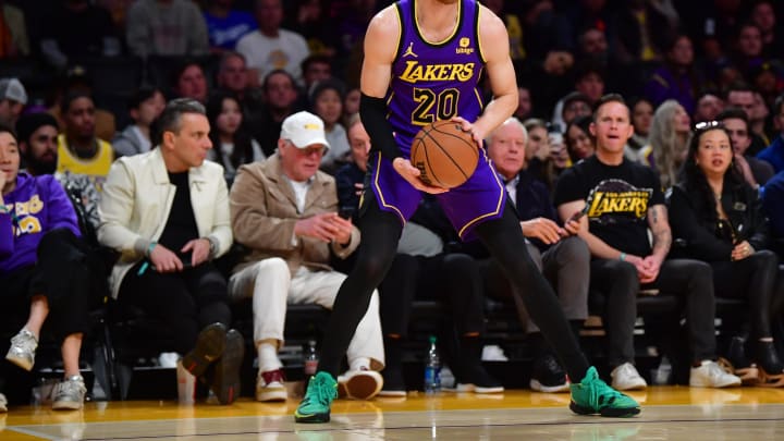 Jan 11, 2024; Los Angeles, California, USA; Los Angeles Lakers guard Dylan Windler (20) controls the ball against the Phoenix Suns during the second half at Crypto.com Arena. Mandatory Credit: Gary A. Vasquez-USA TODAY Sports Jan 11, 2024; Los Angeles, California, USA; Los Angeles Lakers guard Dylan Windler (20) controls the ball against the Phoenix Suns during the second half at Crypto.com Arena. Mandatory Credit: Gary A. Vasquez-USA TODAY Sports