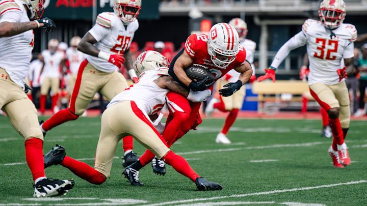 DC Defenders wide receiver Chris Rowland (12) is tackled by Birmingham Stallions cornerback Mario Goodrich (16) in the first quarter at Audi Field.